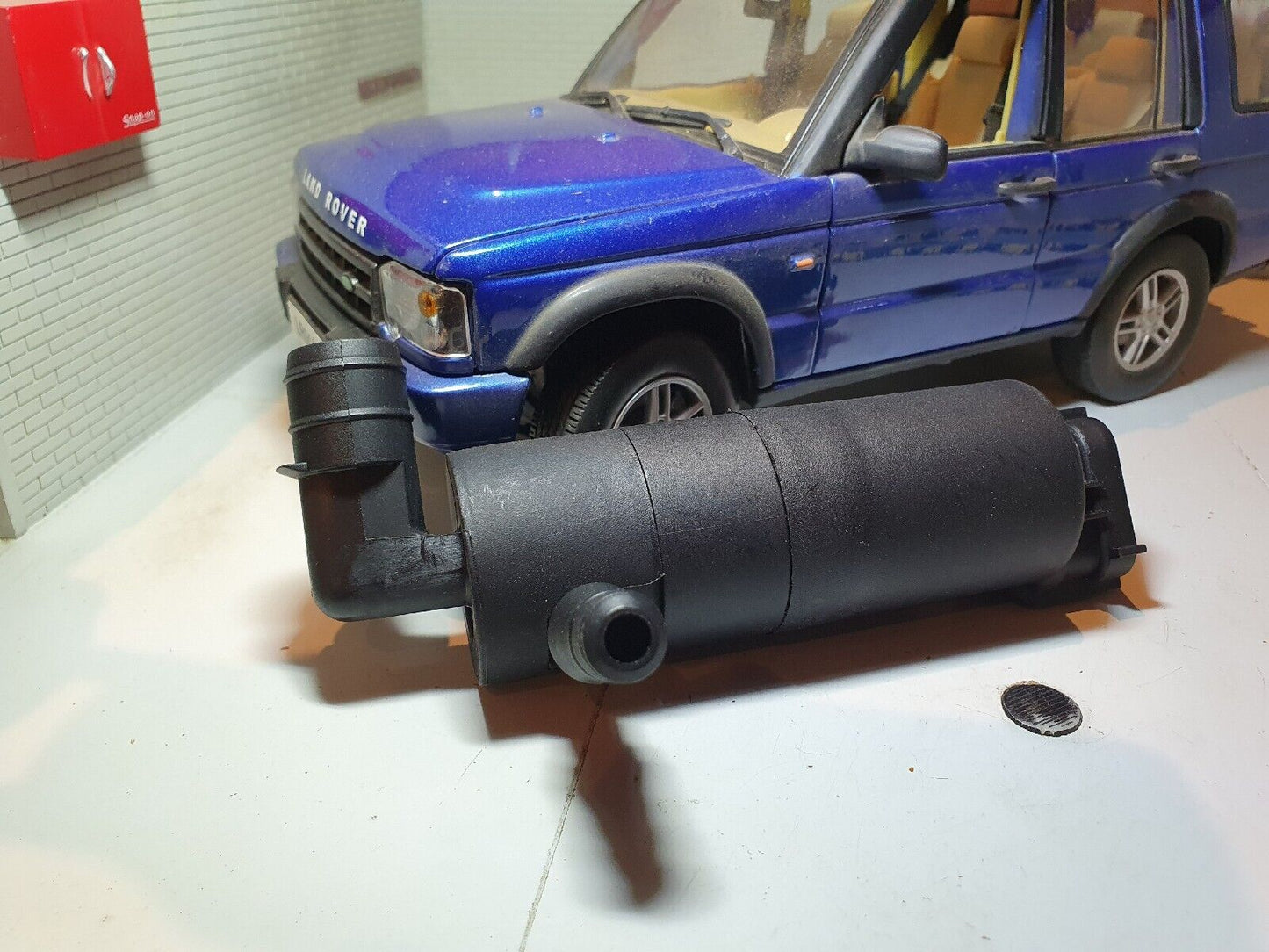 Discovery 2 Headlight Washer Pump DMC100560