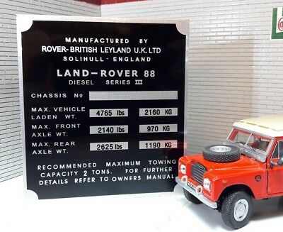 Land Rover 88 Series 3 Diesel chassis VIN plate. The text on top reads "Manufactured by Rover-British Leyland U.K. LTD Solihull England". Beneath is a space for the chassis number, maximum vehicle weights, and recommended towing capacity (2 Tons)