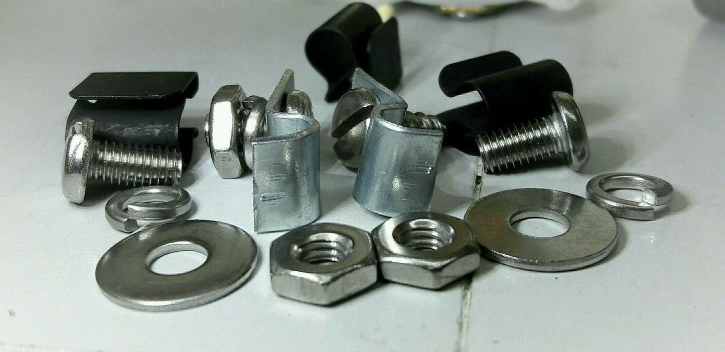 A collection of metal engine bay clips and fittings, including screws, nuts, and washers, made of stainless steel or another durable metal, displayed on a white surface.