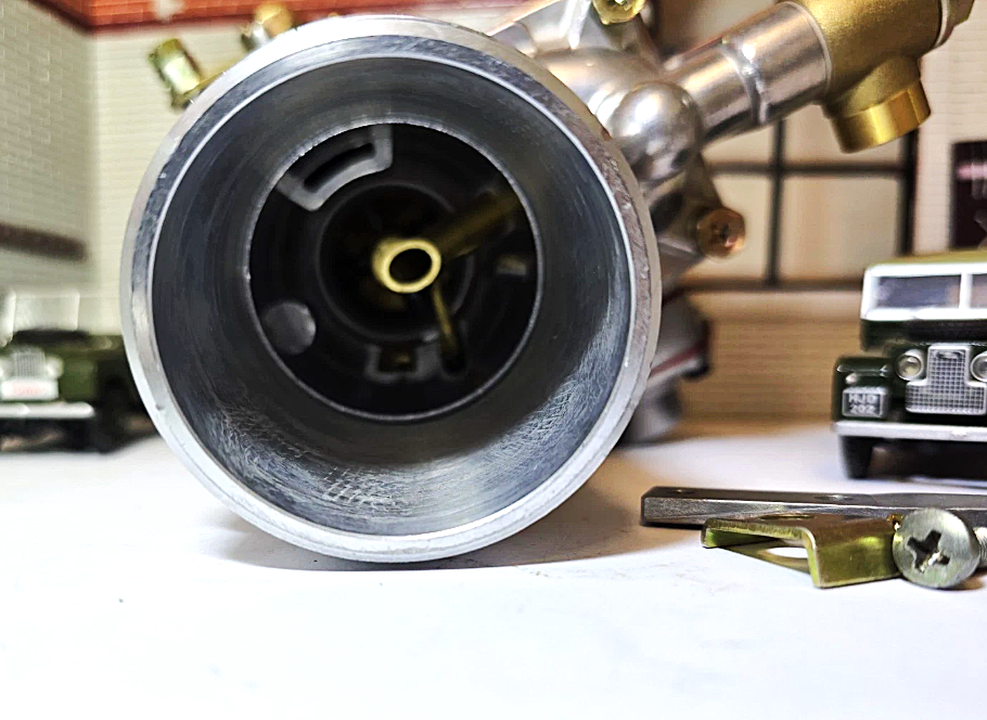 Close-up of a metallic valve or component with a blurred background