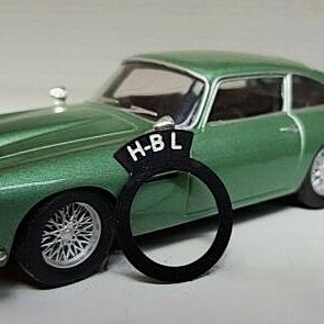 Aston Martin style switch tag reading "H-BL".