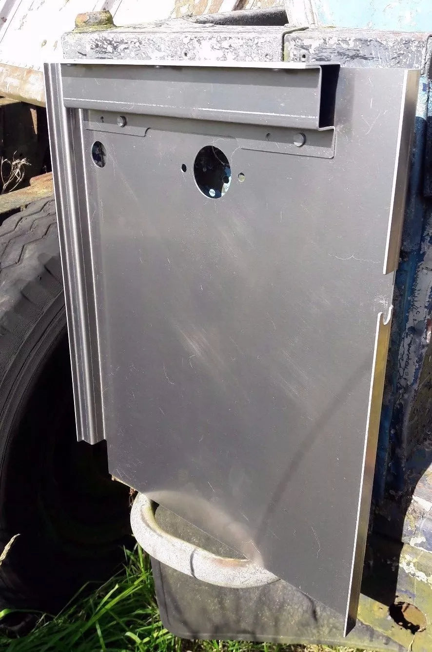 Bits4Landys Land Rover Long wheel base rear quarter tub repair panel, sat in position on a vehicle but showing the reverse side. With holes for light fittings and alignment.