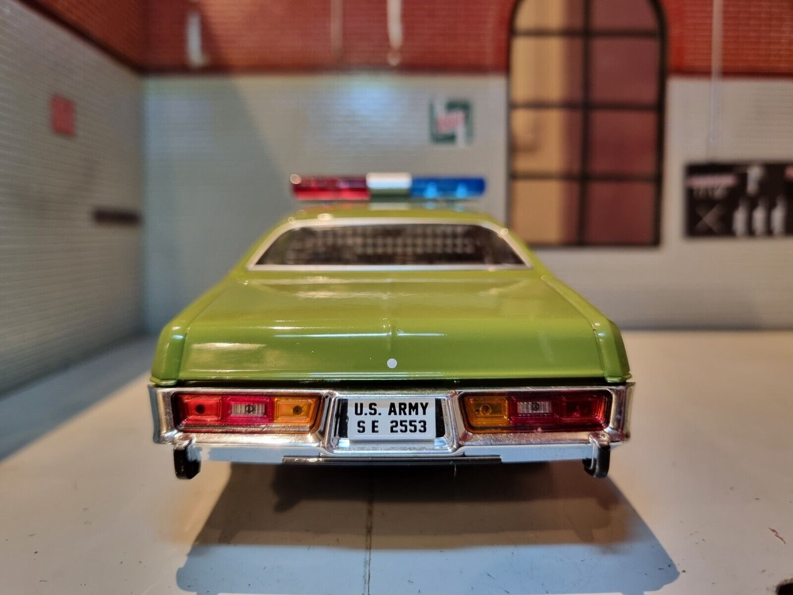 Rear View of A 1:24 Scale Green Plymouth Fury, Number plate Reads U.S. ARMY S E 2553