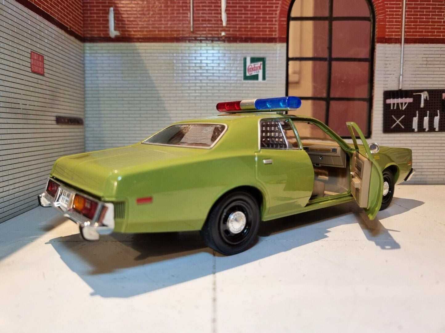 Rear 3/4 View (facing right) of A 1:24 Scale Green Plymouth Fury With The Passenger Door Open