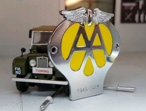 A half scale retro AA badge suitable for Toylanders. It has a Yellow centre with a chrome overlay making the AA logo from the 1940s-1960s. Two stainless rivets siton  either side. 