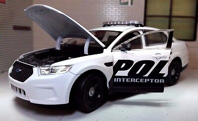 Ford Taurus Polizeiauto Interceptor Welly 1:24